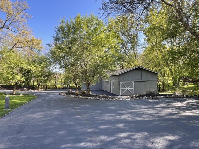 184A River Rd, Lake Barrington, IL 60010 - view of property exterior with a barn and an outbuilding