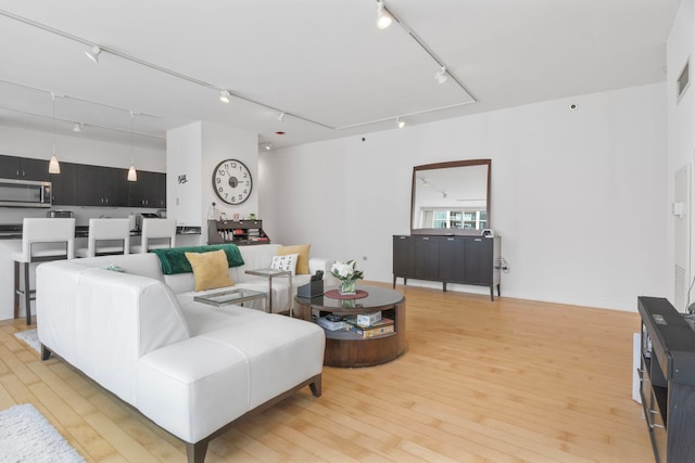 8 E Randolph St Unit 1401, Chicago, IL 60601 - living room featuring track lighting and light wood-type flooring