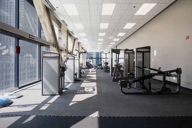 8 E Randolph St Unit 1401, Chicago, IL 60601 - gym featuring a drop ceiling and expansive windows