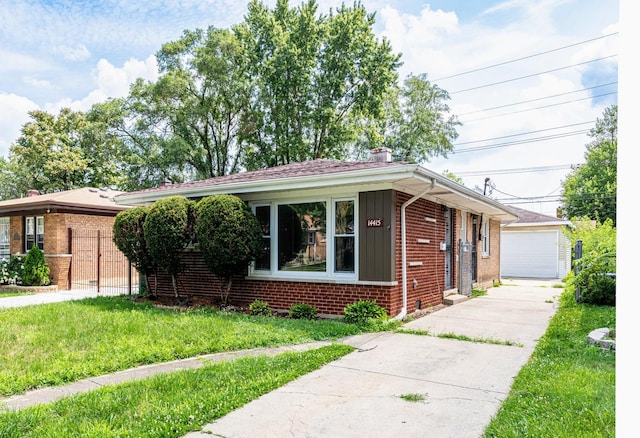 14415 Avalon Ave, Dolton, IL 60419 - view of front of property featuring brick siding, a chimney, board and batten siding, and a detached garage