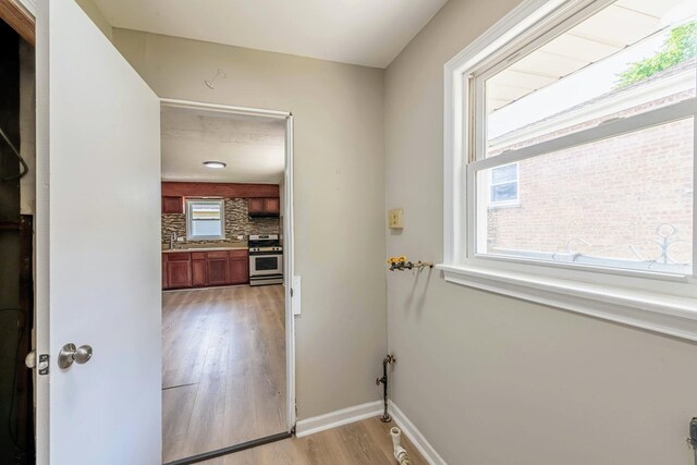 14415 Avalon Ave, Dolton, IL 60419 - hall featuring light wood-style floors and baseboards