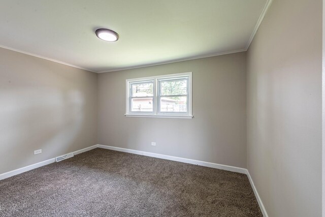 14415 Avalon Ave, Dolton, IL 60419 - spare room with dark carpet and crown molding