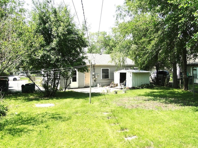 200 Romayne Ave, Joliet, IL 60436 - rear view of house featuring a patio and a storage unit