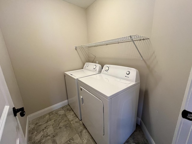 1318 Myrtle Beach Ave, Champaign, IL 61822 - washroom featuring washer and dryer and light marble finish flooring