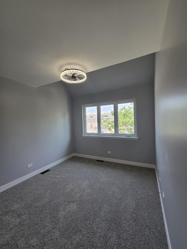 8620 S Normal Ave, Chicago, IL 60620 - empty room featuring dark carpet and baseboards