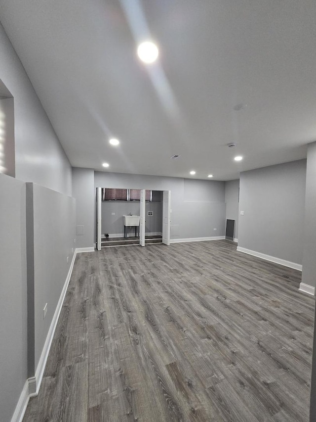 8620 S Normal Ave, Chicago, IL 60620 - finished below grade area featuring dark wood-style flooring and recessed lighting