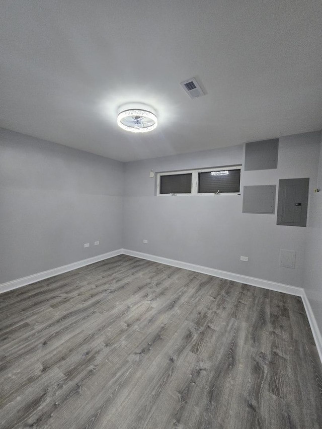 8620 S Normal Ave, Chicago, IL 60620 - unfurnished room with electric panel and wood finished floors