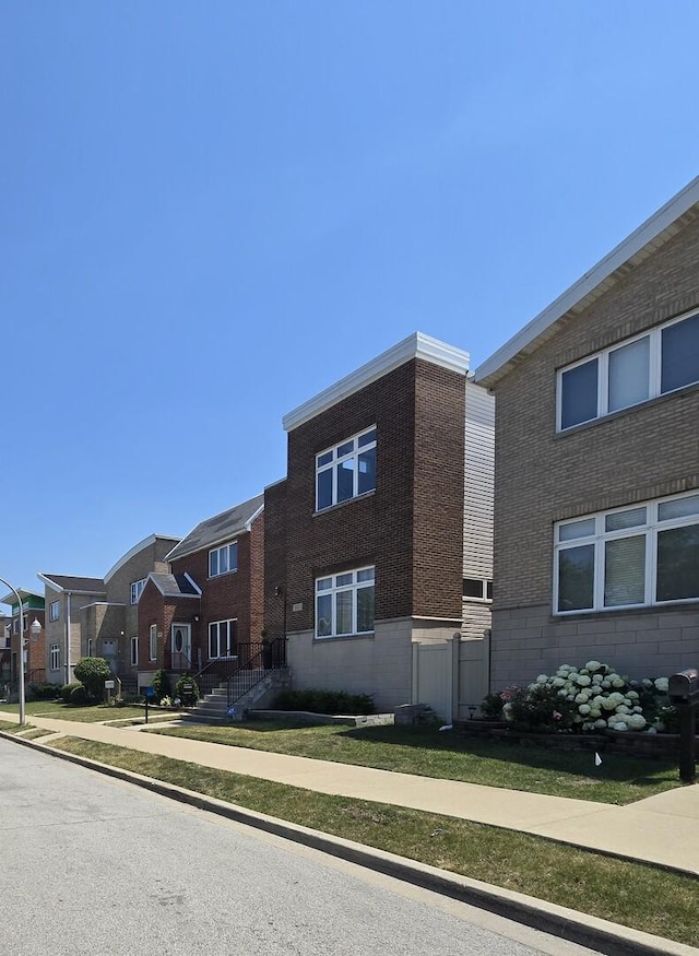 8620 S Normal Ave, Chicago, IL 60620 - view of front of house featuring brick siding and a residential view