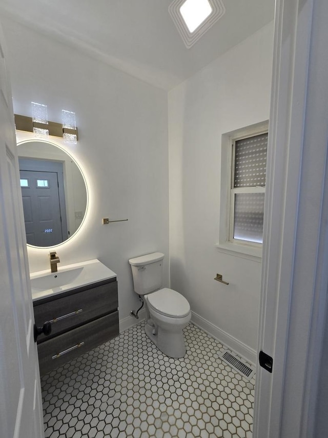 8620 S Normal Ave, Chicago, IL 60620 - half bath featuring vanity and tile patterned floors