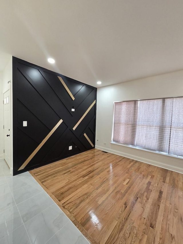 8620 S Normal Ave, Chicago, IL 60620 - spare room with recessed lighting and light wood-style floors