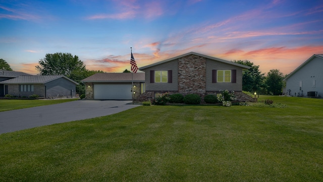 1320 Lake Summerset Rd, Davis, IL 61019 - mid-century inspired home featuring concrete driveway, a front lawn, and an attached garage