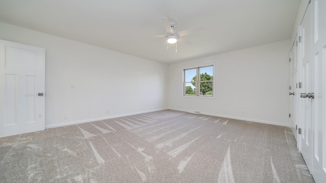 1320 Lake Summerset Rd, Davis, IL 61019 - empty room with a ceiling fan and light colored carpet
