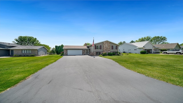 1320 Lake Summerset Rd, Davis, IL 61019 - split level home with stone siding, a front lawn, and driveway