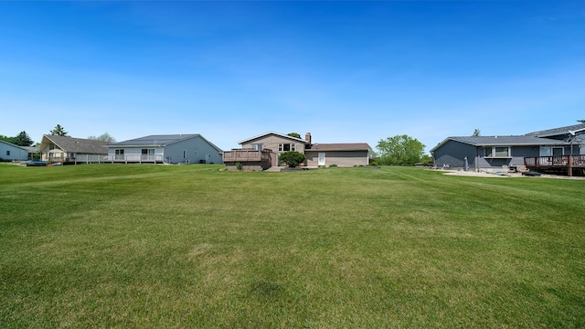 1320 Lake Summerset Rd, Davis, IL 61019 - view of grassy yard featuring a deck