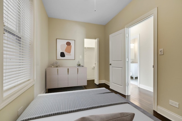 2732 W Belmont Ave, Chicago, IL 60618 - bedroom with dark wood-style floors and baseboards