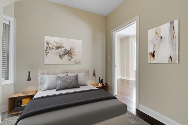 2732 W Belmont Ave, Chicago, IL 60618 - bedroom featuring dark wood finished floors and baseboards