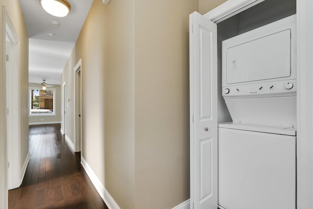 2732 W Belmont Ave, Chicago, IL 60618 - washroom featuring stacked washer / dryer and dark wood-style floors