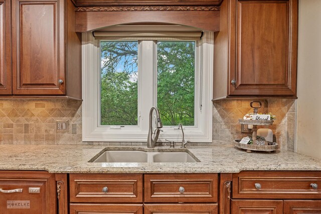 7S745 State Route 53rd Hwy, Naperville, IL 60540 - kitchen with brown cabinetry, backsplash, and light stone counters