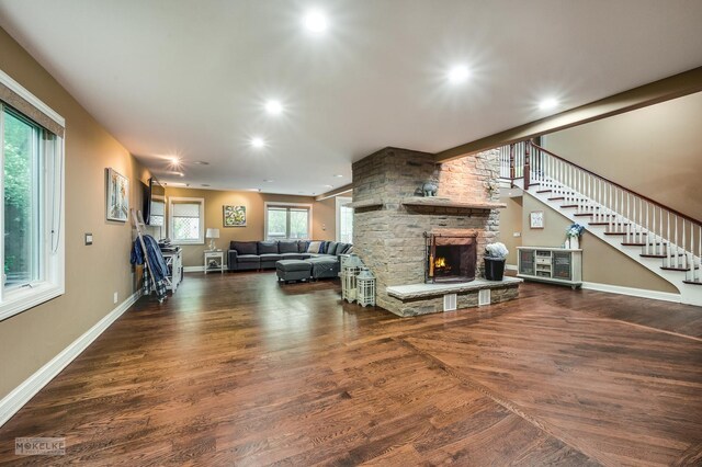 7S745 State Route 53rd Hwy, Naperville, IL 60540 - living area with a fireplace, wood finished floors, stairway, and recessed lighting