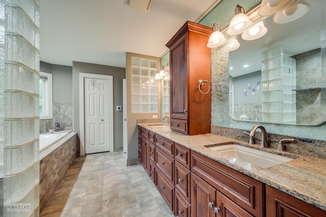 7S745 State Route 53rd Hwy, Naperville, IL 60540 - full bathroom with double vanity, a bath, and stone finish floors