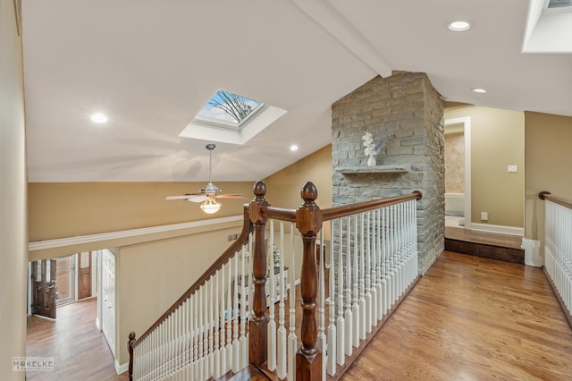7S745 State Route 53rd Hwy, Naperville, IL 60540 - hall with a skylight, wood finished floors, and an upstairs landing