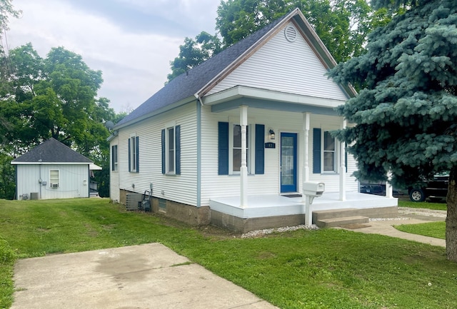 42 2nd St, Lasalle, IL 61301 - view of side of home featuring covered porch, a lawn, and a shingled roof