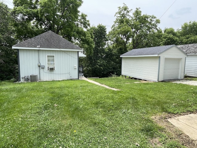 42 2nd St, Lasalle, IL 61301 - view of green lawn featuring an outbuilding, view of scattered trees, and a detached garage