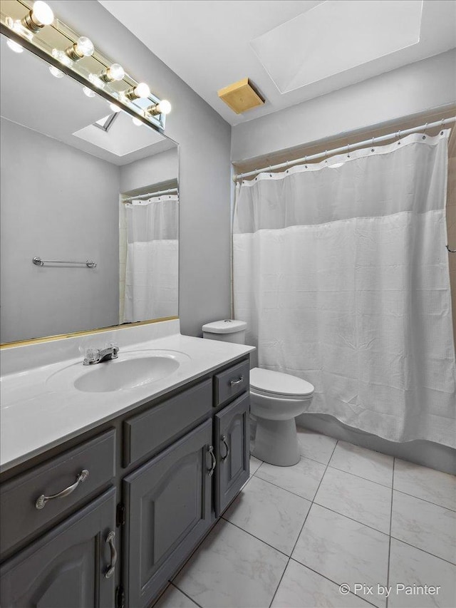 514 Doral Ln, North Aurora, IL 60542 - full bathroom with a skylight, vanity, and a shower with shower curtain