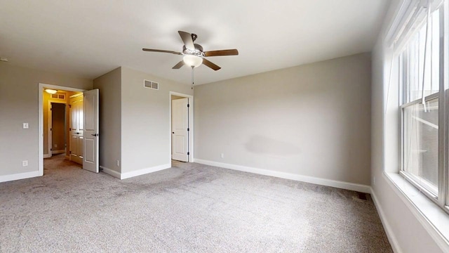 1516 Stonebluff Ct, Champaign, IL 61822 - unfurnished bedroom featuring carpet flooring and a ceiling fan