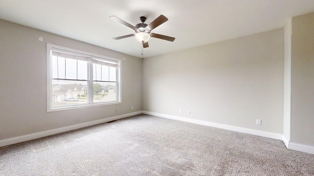 1516 Stonebluff Ct, Champaign, IL 61822 - carpeted empty room featuring baseboards and ceiling fan