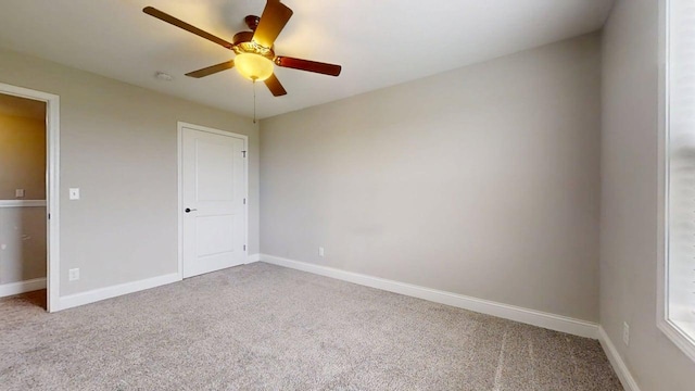 1516 Stonebluff Ct, Champaign, IL 61822 - unfurnished bedroom featuring carpet flooring and ceiling fan
