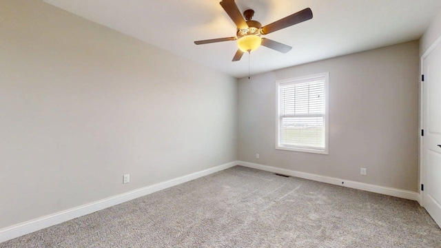 1516 Stonebluff Ct, Champaign, IL 61822 - spare room with a ceiling fan and light carpet