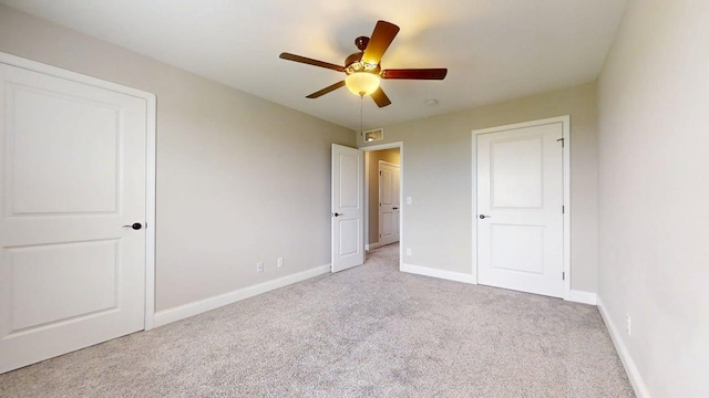 1516 Stonebluff Ct, Champaign, IL 61822 - unfurnished bedroom featuring carpet floors and a ceiling fan