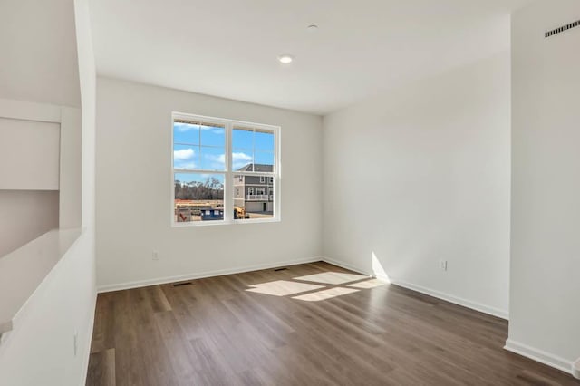 2167 Yellowstone Blvd, Mundelein, IL 60060 - empty room with wood finished floors and recessed lighting