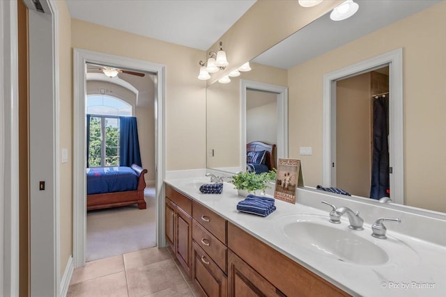 675 Oak Ln, South Elgin, IL 60177 - bathroom with ensuite bath, double vanity, tile patterned floors, and a ceiling fan