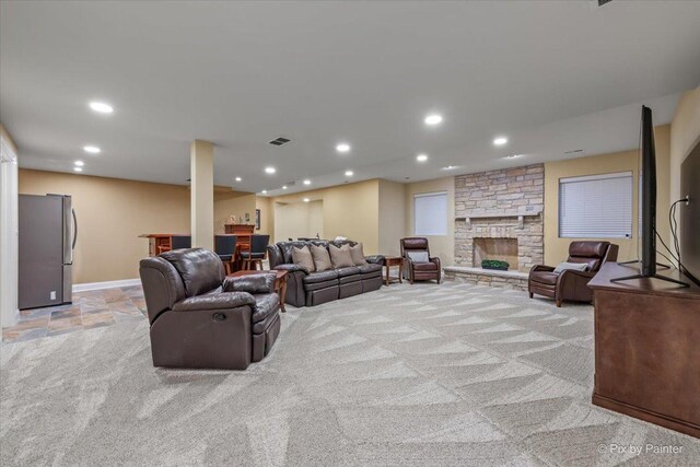 675 Oak Ln, South Elgin, IL 60177 - living area with light colored carpet, recessed lighting, a fireplace, and bar area