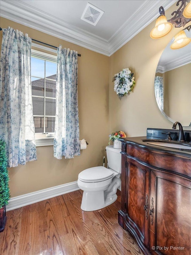 675 Oak Ln, South Elgin, IL 60177 - bathroom with vanity, wood finished floors, and crown molding