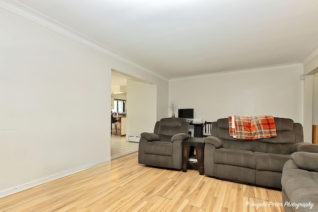 12977 W 9th St, Zion, IL 60099 - living area with crown molding, wood finished floors, and a baseboard radiator