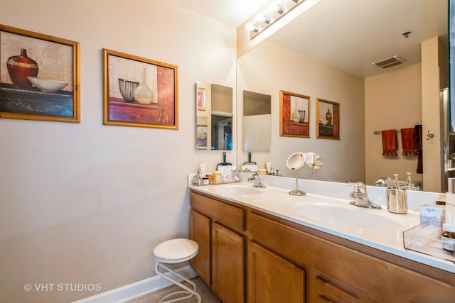 1841 S Calumet Ave Unit 1304, Chicago, IL 60616 - bathroom featuring double vanity and baseboards