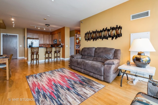 1841 S Calumet Ave Unit 1304, Chicago, IL 60616 - living area with light wood-style floors and baseboards