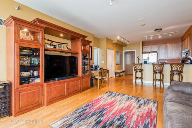 1841 S Calumet Ave Unit 1304, Chicago, IL 60616 - living room with light wood-type flooring and rail lighting