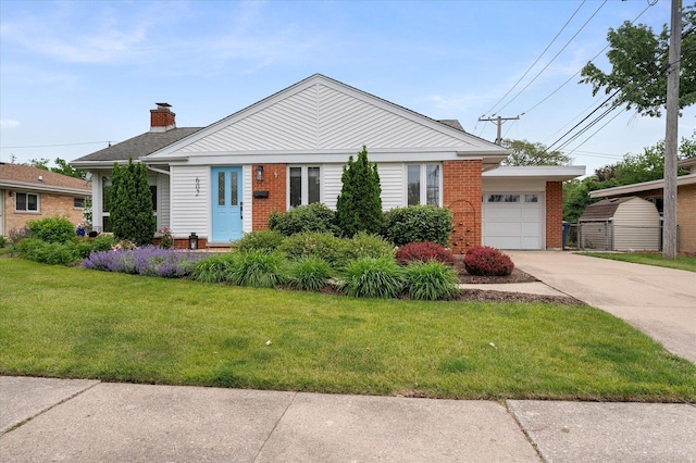 602 E Park Ave, Elmhurst, IL 60126 - single story home with brick siding, a garage, a front yard, and driveway