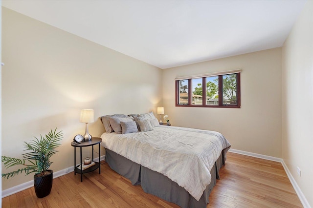 602 E Park Ave, Elmhurst, IL 60126 - bedroom with light wood finished floors and baseboards