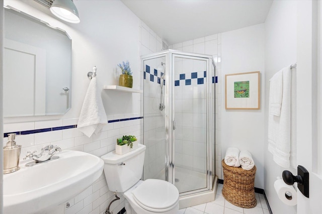 602 E Park Ave, Elmhurst, IL 60126 - bathroom with a shower stall and tile patterned flooring