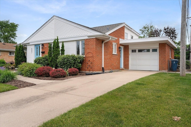 602 E Park Ave, Elmhurst, IL 60126 - view of front of property featuring a garage, concrete driveway, brick siding, and a front lawn