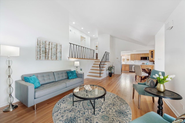 602 E Park Ave, Elmhurst, IL 60126 - living room with light wood finished floors, high vaulted ceiling, stairway, and recessed lighting