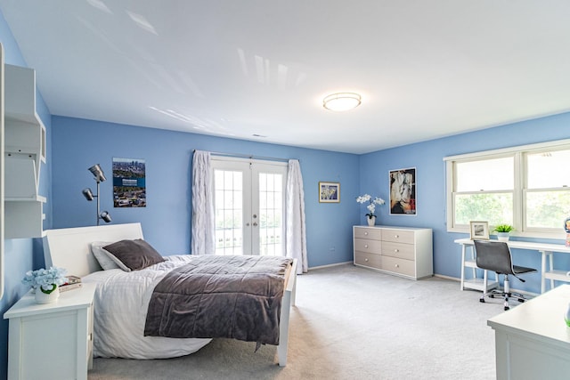 2120 Wilmette Ave, Wilmette, IL 60091 - bedroom featuring french doors, access to exterior, multiple windows, and light colored carpet