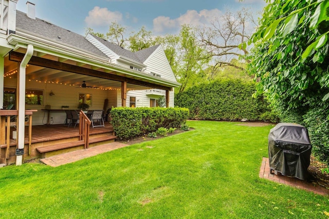 2120 Wilmette Ave, Wilmette, IL 60091 - view of grassy yard featuring a deck and a ceiling fan