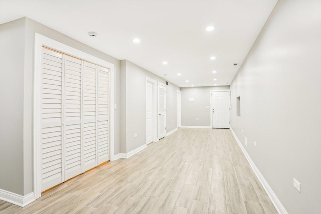 2922 W Polk St, Chicago, IL 60612 - unfurnished living room featuring light wood-type flooring and recessed lighting