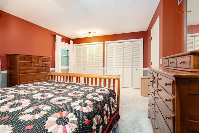 212 Rebecca Ln, Normal, IL 61761 - bedroom with carpet floors and two closets
